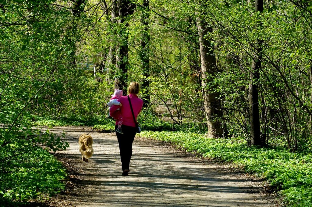 Mother and Child and dog in park